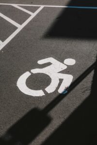 Picture of a handicap accessible sign on a parking spot.